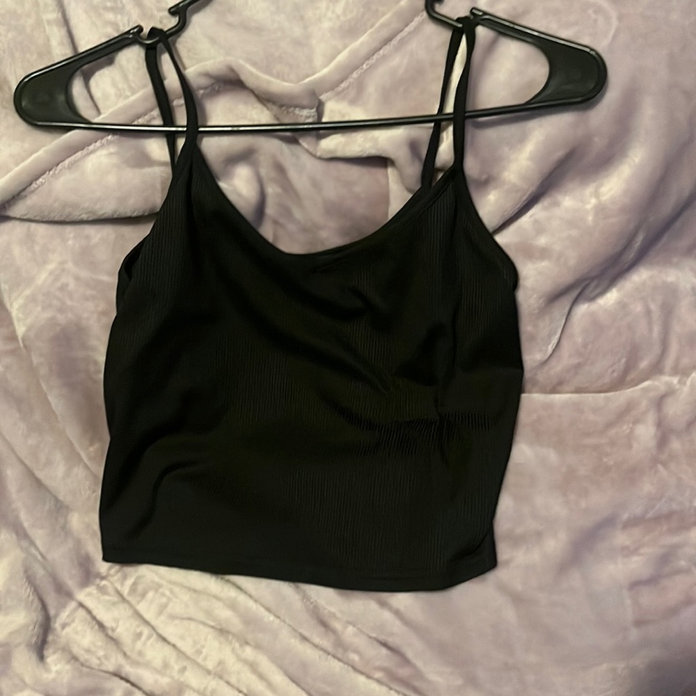 Black tank top. Available for discount bundle with other qualifying items!